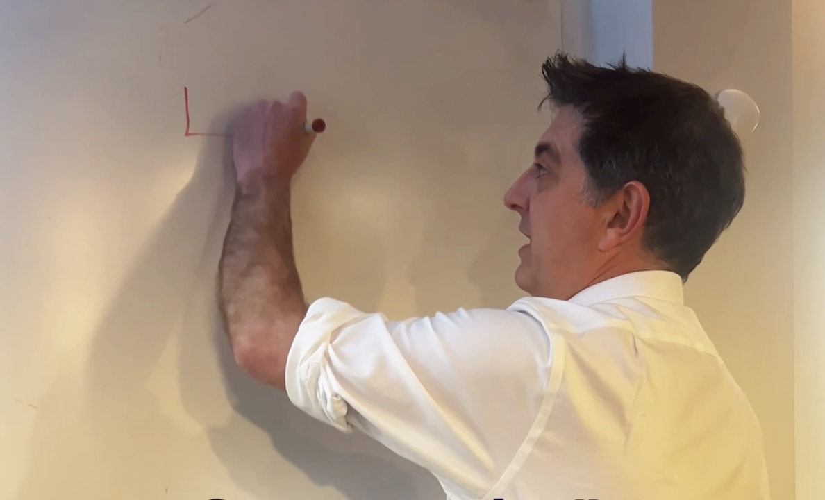 Dan Blake drawing a diagram